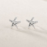 PENDIENTES CIRCONITAS BLANCAS RHEA