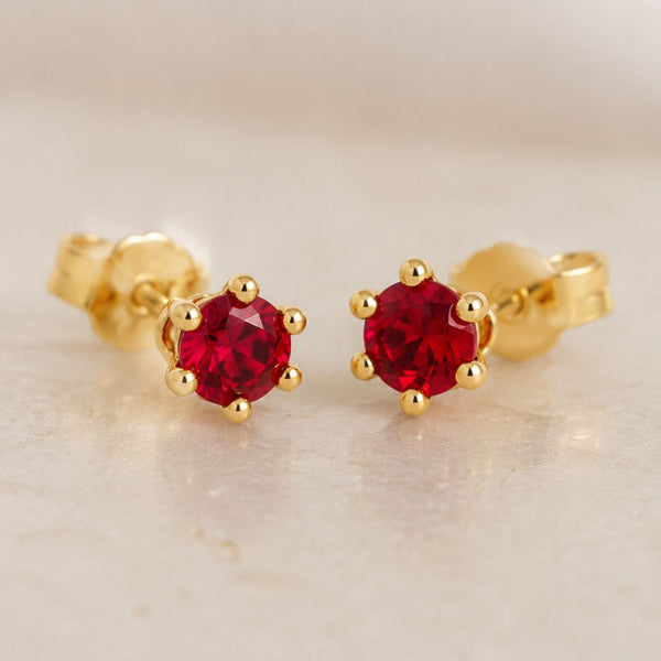 PENDIENTES CIRCONITAS ROJAS LEIA