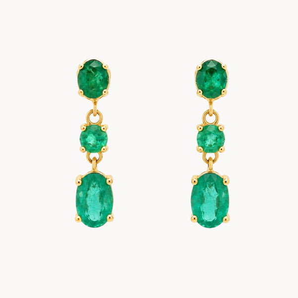 Long earrings with oval and round emeralds
