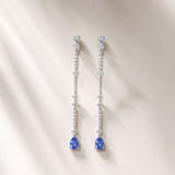 Long sapphire earrings with diamonds