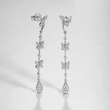 BRINCOS LONGOS FOLHAS E BORBOLETAS COM DIAMANTES DORIT II