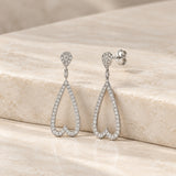 PENDIENTES LARGOS SILUETA CORAZON CON DIAMANTES