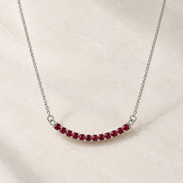 COLLAR BARRA CURVA DE RUBIES