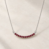 COLLAR BARRA CURVA DE RUBIES