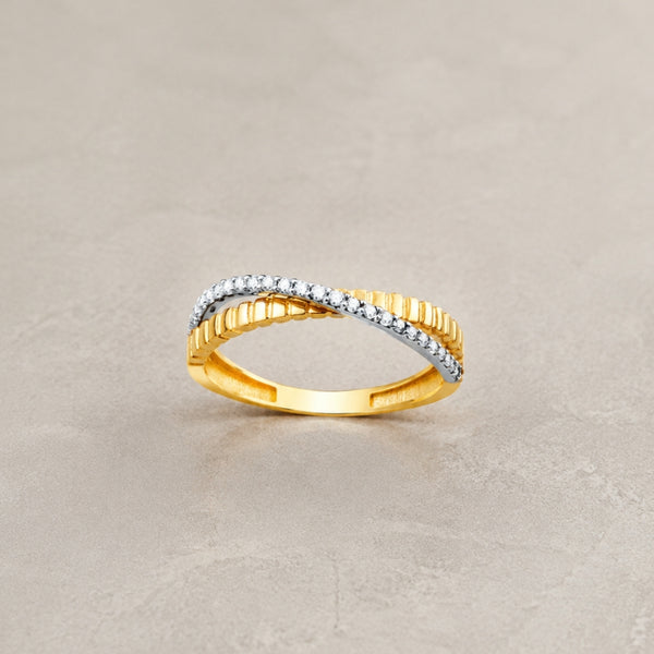 Two-tone crossover ring with cubic zirconia stones
