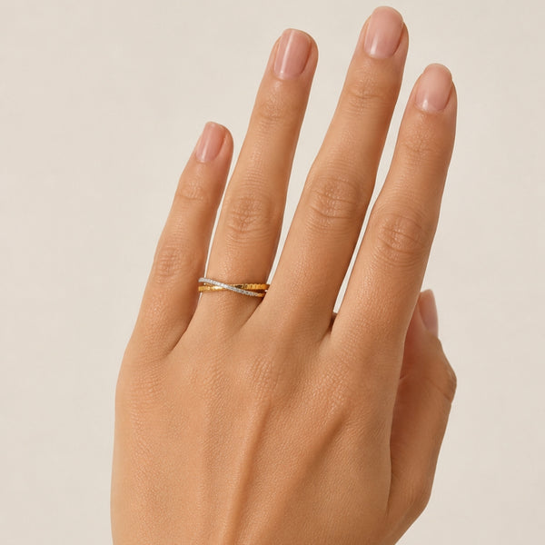 Two-tone crossover ring with cubic zirconia stones