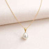 COLGANTE CON PERLA CYRA