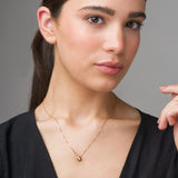 COLGANTE DIAMANTE CHATON 0.10 QUILATES PUNTO DE LUZ