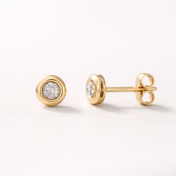 PENDIENTES CON DIAMANTE CHATON 0.20 QUILATES PUNTO DE LUZ