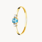 ANILLO TOPACIO AZUL OVAL Y CIRCONITAS