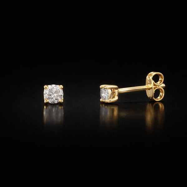 BRINCOS COM DIAMANTE GARRAS 0,32 QUILATES MICHELLE