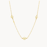 NECKLACE WITH PEARLS AND HAZEL BALLS