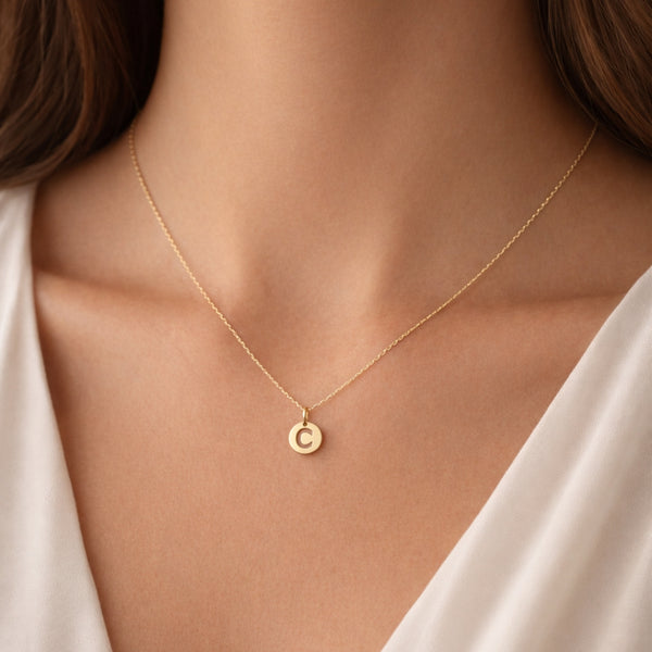 PENDENTE COM INICIAL RECORTADA EM DISCO