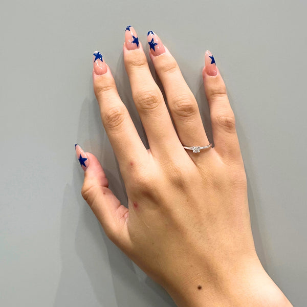 ANILLO SOLITARIO CUATRO GARRAS CON DIAMANTE 0.14 QUILATES GERTIE