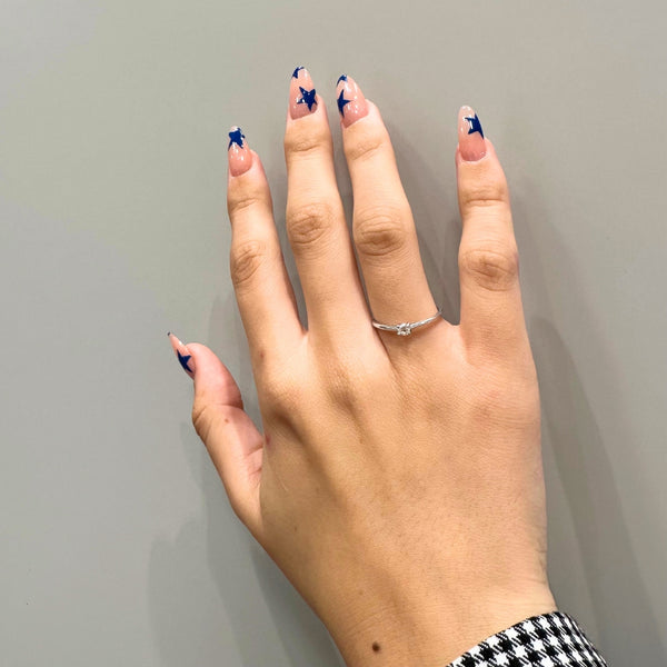 ANILLO SOLITARIO CUATRO GARRAS CON DIAMANTE 0.12 QUILATES GERTIE
