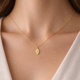 COLGANTE CHAPA CON DIAMANTES Y CRUZ