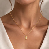 COLGANTE CHAPA CON DIAMANTES Y CRUZ