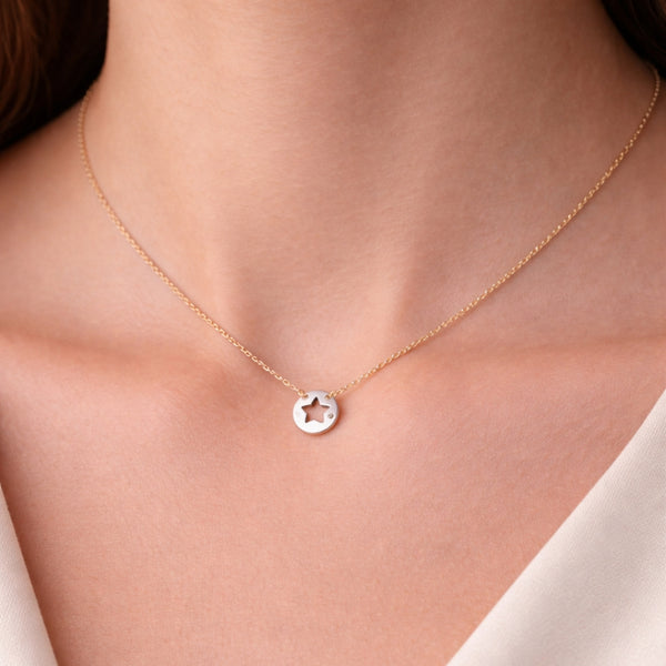 COLGANTE ESTRELLA CON DIAMANTE MIDORI