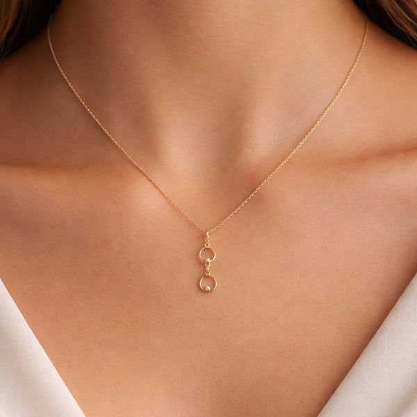 COLGANTE DOBLE CIRCULO CON DIAMANTES BASIA