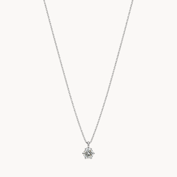 COLGANTE CON DIAMANTE SEIS GARRAS 0.30 QUILATES PUNTO DE LUZ