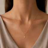 Oval pendant with two diamonds in a chaton setting