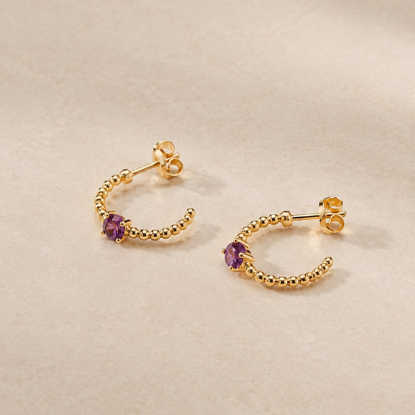Drop earrings with beads and amethyst