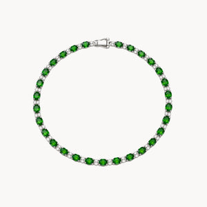 Rivière bracelet with emeralds and diamonds