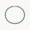 Rivière bracelet with emeralds and diamonds