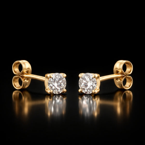 PENDIENTES CON DIAMANTE GARRAS 0.30 QUILATES PUNTO DE LUZ