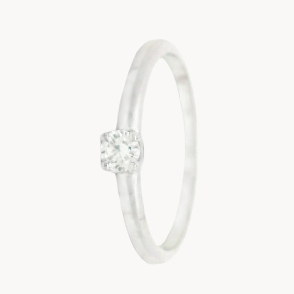 ANILLO SOLITARIO CUATRO GARRAS CON DIAMANTE 0.13 QUILATES LESLIE