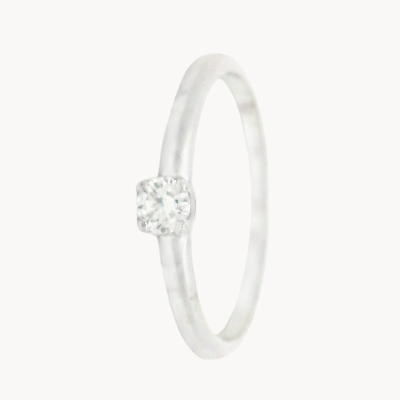 ANILLO SOLITARIO CUATRO GARRAS CON DIAMANTE 0.13 QUILATES LESLIE