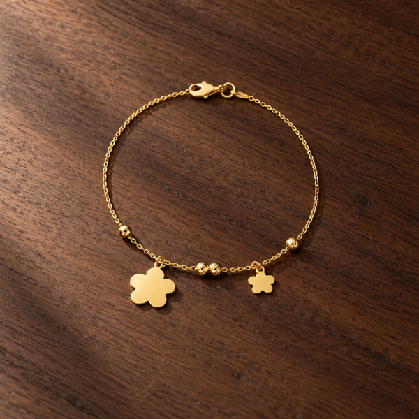 PULSERA FLORES Y BOLAS