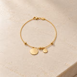 PULSERA DISCOS ASIMETRICOS COLGANTES