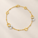 PULSERA BICOLOR AROS ENTRELAZADOS