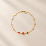 PULSERA CON CIRCONITAS Y ESMALTE ROJO