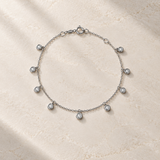 PULSERA CON CIRCONITAS EN CHATON COLGANTES