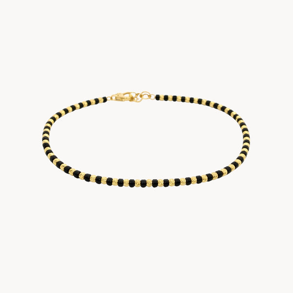 PULSEIRA BOLSAS DE OURO E ÔNIX ISHALI