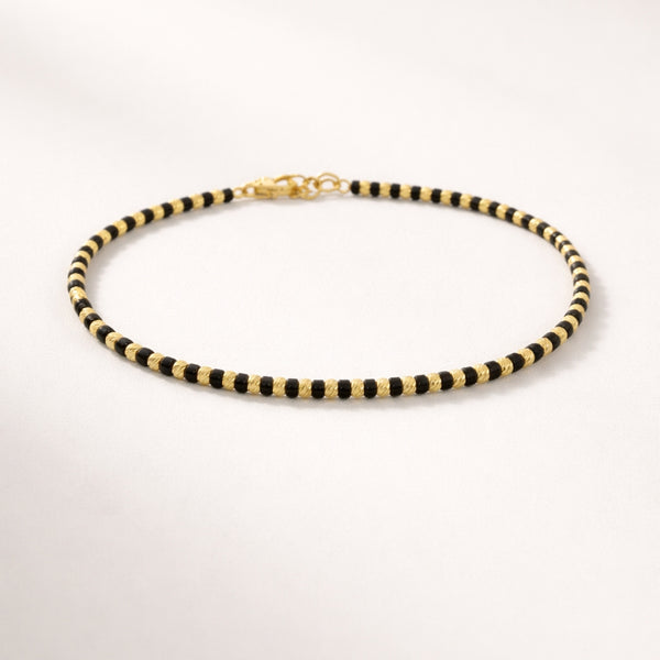 PULSEIRA BOLSAS DE OURO E ÔNIX ISHALI