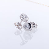 PENDIENTES CON DIAMANTE CHATON 0.16 QUILATES ASYA