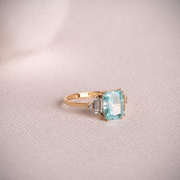 ANILLO TOPACIO PARAIBA ICE CUT Y CIRCONITAS