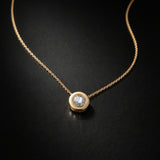 COLGANTE DIAMANTE CHATON 0.15 QUILATES PUNTO DE LUZ