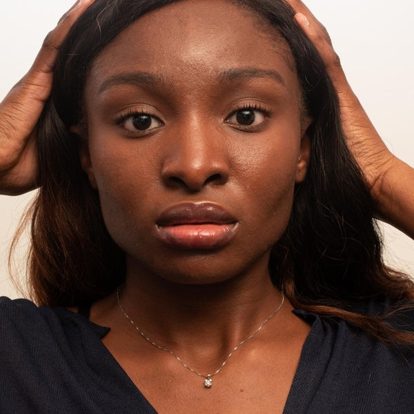 COLGANTE CON DIAMANTE GARRAS 0.20 QUILATES PUNTO DE LUZ