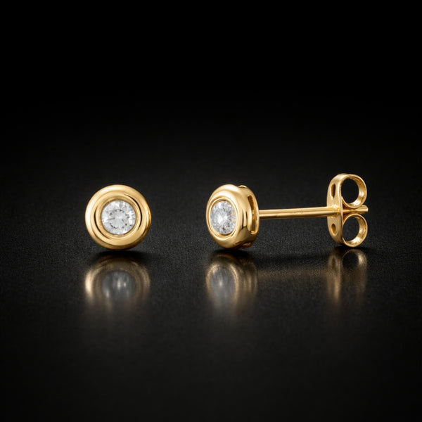 PENDIENTES CON DIAMANTE CHATON 0.30 QUILATES PUNTO DE LUZ