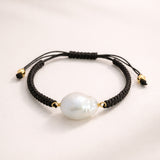 PULSEIRA MACRAMÉ COM PÉROLA BARROCA FORMA 3