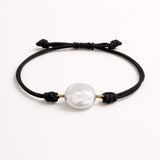 PULSEIRA MACRAMÉ COM PÉROLA BARROCA FORMA 1