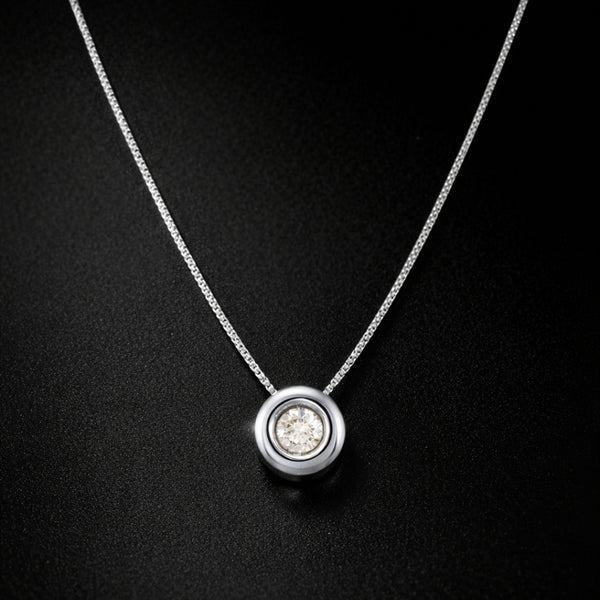 COLGANTE DIAMANTE CHATON 0.20 QUILATES PUNTO DE LUZ