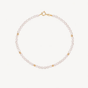 PULSEIRA COM PÉROLAS DE GRÃO E BOLAS DE OURO