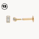 EAR PIERCING WITH CYNTHIA CLAWS ZIRCONIAS