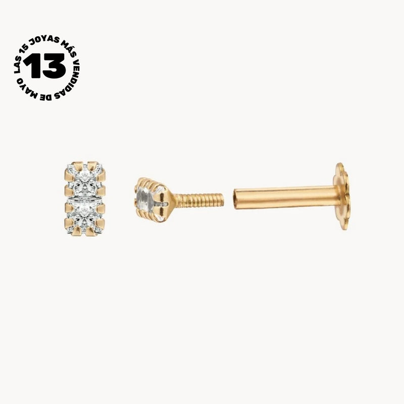 EAR PIERCING WITH CYNTHIA CLAWS ZIRCONIAS