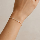 PULSEIRA COM PÉROLAS DE GRÃO E BOLAS DE OURO